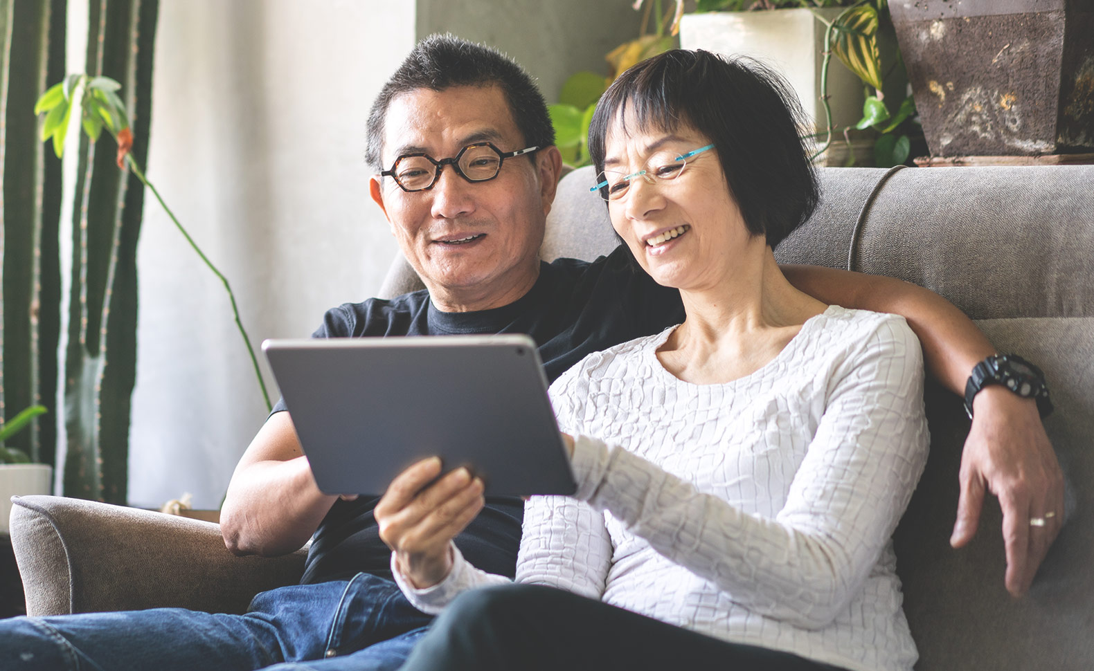 Couple looking at iPad